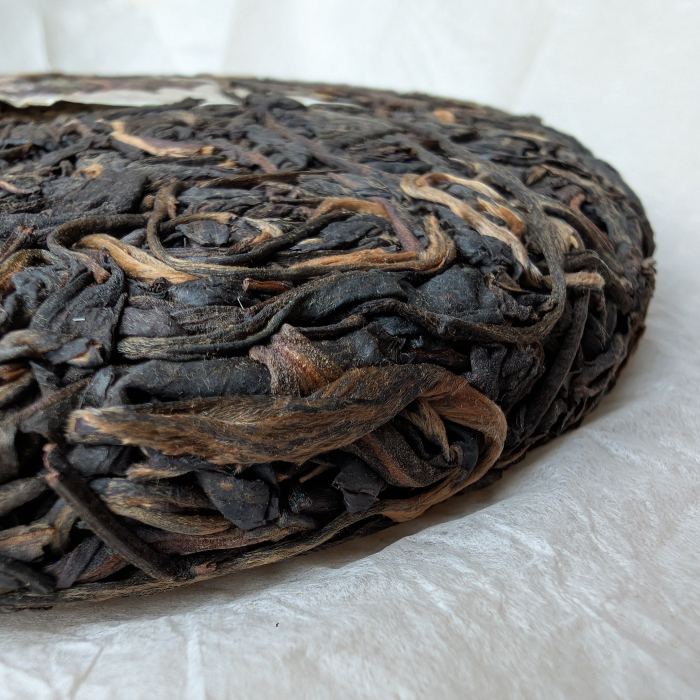 Torta Pu Erh Sheng invecchiato Yiwu 2010 Ancient Gate 200g